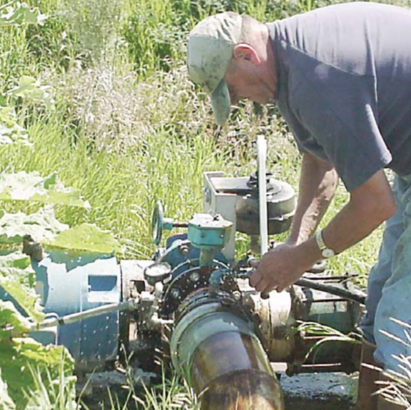 man working on motor